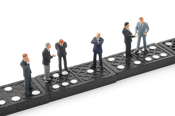 Image showing business man on domino 