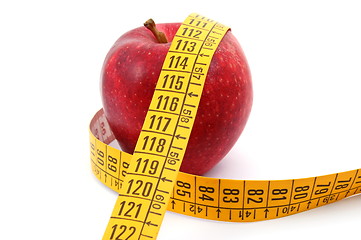 Image showing Apple and measuring tape on white