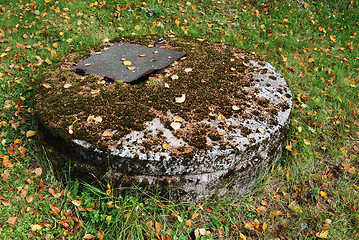 Image showing typical concrete water well with moss