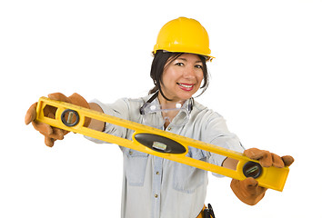 Image showing Hispanic Woman with Hard Hat Holding Level