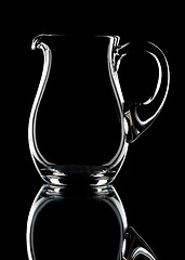 Image showing Glass pitcher on a black background