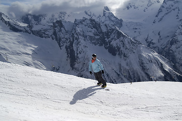 Image showing Snowboarder on ski slope