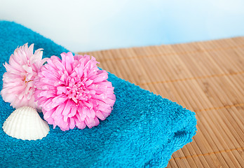 Image showing Flowers and Towel