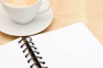 Image showing Notebook And Coffee