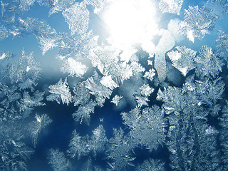 Image showing ice patterns and sun on glass