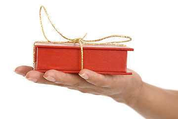 Image showing red gift box in hand girls