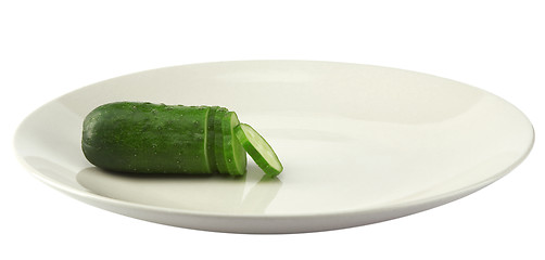 Image showing fresh green cucumber chopped on white plate