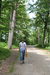 Image showing Woman walking in forest