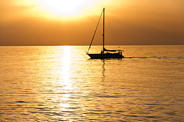 Image showing Sailboat at dawn