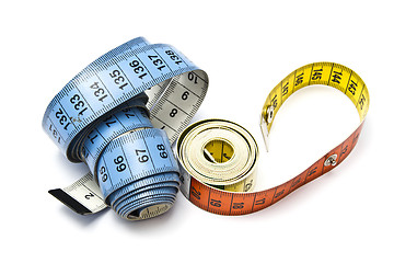 Image showing Tape measure closeup on white background 