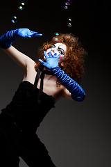 Image showing woman mime with soap bubbles.