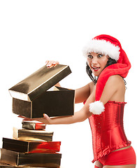 Image showing Beautiful christmas woman in santa hat