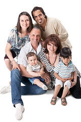 Image showing Studio Shot Of Family Group Sitting In Studio