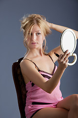 Image showing beautiful woman with mirror