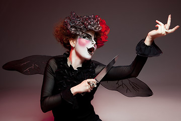 Image showing woman mime with knife