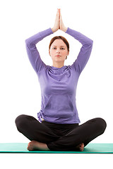 Image showing Young woman practicing yoga