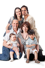 Image showing Studio Shot Of Family Group Sitting In Studio