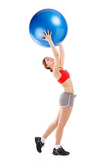 Image showing woman exercising on an exercise ball