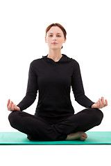 Image showing Young woman practicing yoga