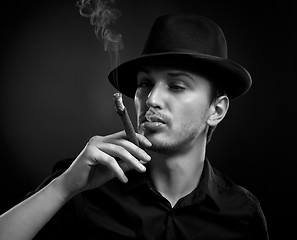 Image showing Man with hat and cigar in Black & White