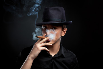 Image showing Gangster look. Man with hat and cigar.