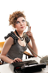 Image showing Businesswoman taking telephone call in office