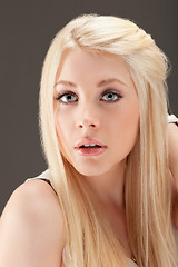 Image showing young woman close up studio portrait