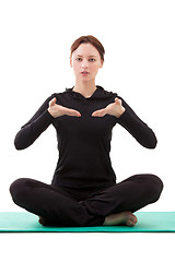 Image showing Young woman practicing yoga