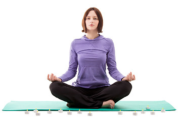 Image showing Young woman practicing yoga