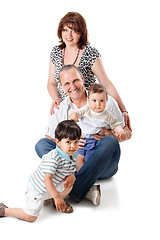 Image showing Happy grandparents with two handsome grandsons