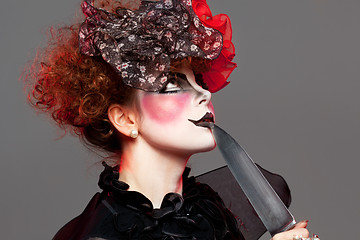 Image showing woman mime with knife