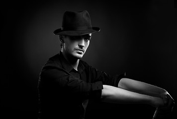Image showing Gangster look. Man with hat and cigar.