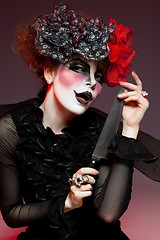 Image showing woman mime with knife