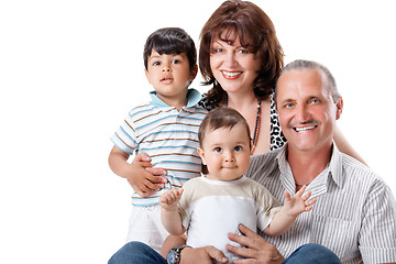 Image showing Happy grandparents with two handsome grandsons