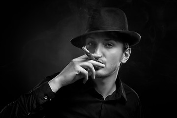 Image showing Man with hat and cigar in Black & White