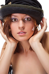 Image showing pretty young woman with black bonnet