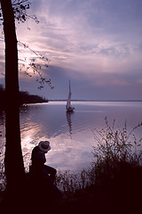 Image showing The photographer  working on the lake