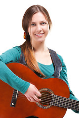 Image showing cowgirl in ahat with acoustic guitar