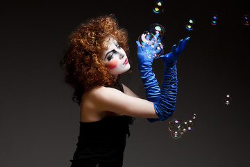 Image showing woman mime with soap bubbles.