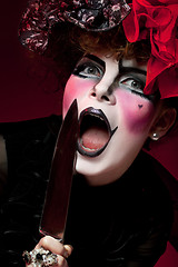 Image showing woman mime with knife