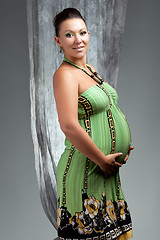 Image showing beautiful pregnant on grey background