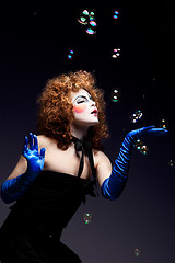 Image showing woman mime with soap bubbles.