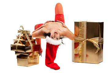 Image showing Beautiful christmas woman in santa hat