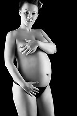 Image showing Beautiful pregnant woman in back & wite