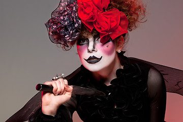 Image showing woman mime with knife