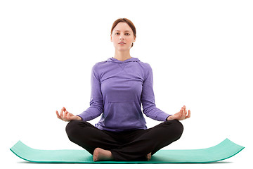 Image showing Young woman practicing yoga