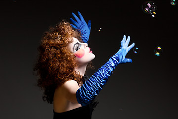 Image showing woman mime with soap bubbles.