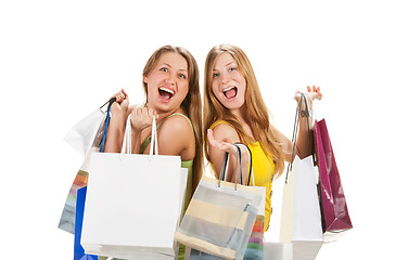 Image showing Shopping. Two beautiful girl with bag