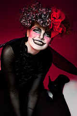 Image showing woman mime with knife