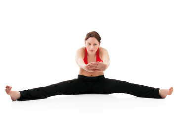 Image showing Young woman doing gymnastics